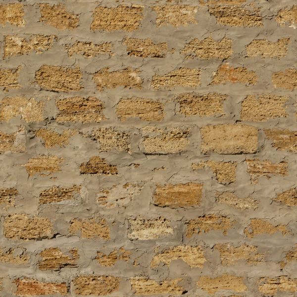 Rough brown brick wall with thick grey cement.