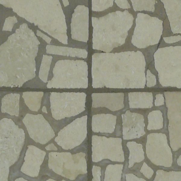 Seamless pavement texture consisting of square tiles made of random pieces of grey slate.