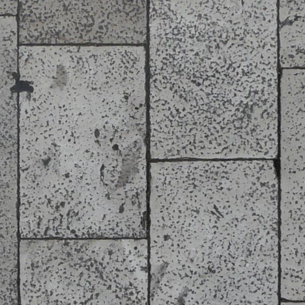 Seamless pavement texture consisting of rectangular stones with rough surface.