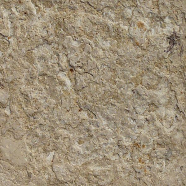 Seamless texture of beige and red, square blocks set evenly with some damage on surface.