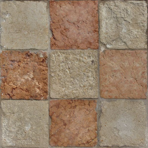 Seamless texture of beige and red, square blocks set evenly with some damage on surface.