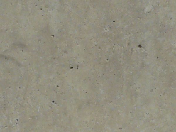 Simple texture of concrete slab with small holes and clean surface.