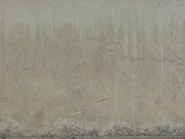 Simple texture of concrete slab with small holes and clean surface.