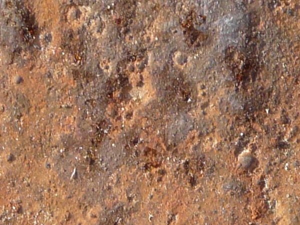 Old metal texture with myriads of large bumps and damage on surface.