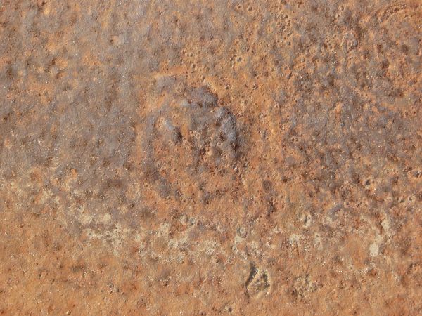 Old metal texture with myriads of large bumps and damage on surface.