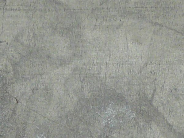 Seamless texture of metal surface in light grey tone with scratches.