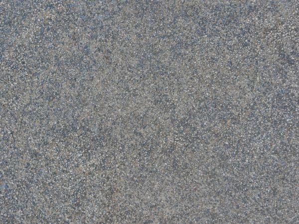 Rough metal texture with rocky surface in grey tone.
