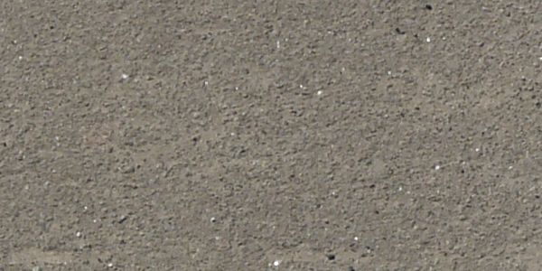 Texture of light grey road of asphalt with white lines and slightly worn surface.