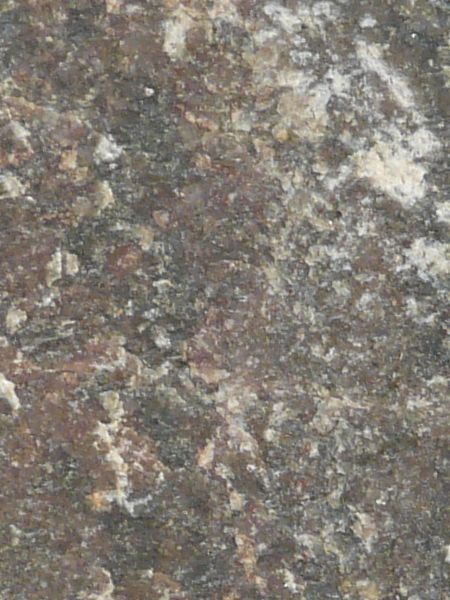 Granite texture in various colors with mixed patterns and flat, slightly rough surface.