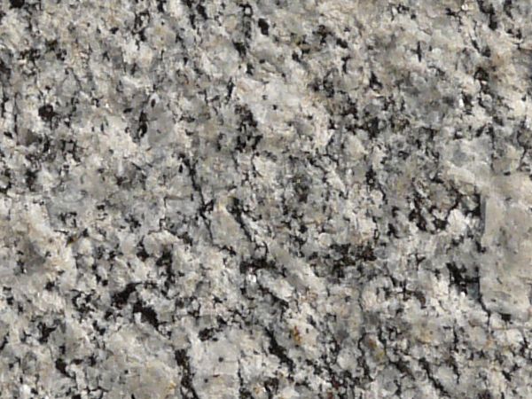 Texture consisting of granite in black and white tones with rough ...