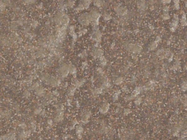 Rough rock texture in consistent, brown tone with flat surface.
