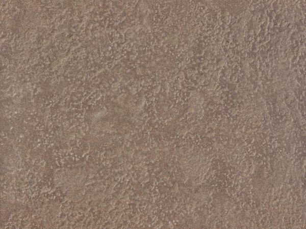 Rough rock texture in consistent, brown tone with flat surface.