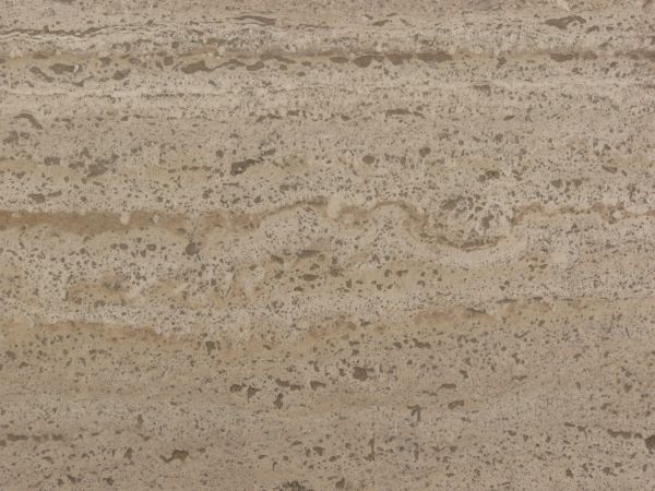 Stone texture in light beige tone with smooth surface and dark spots throughout.