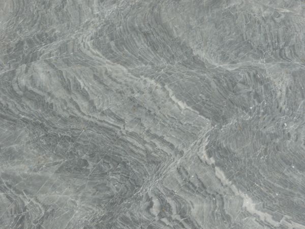 Smooth stone texture in grey and white tones with random patterns on surface.