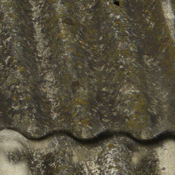 Seamless roof texture consisting of unevenly set, black sheet metal with wave-like surface.