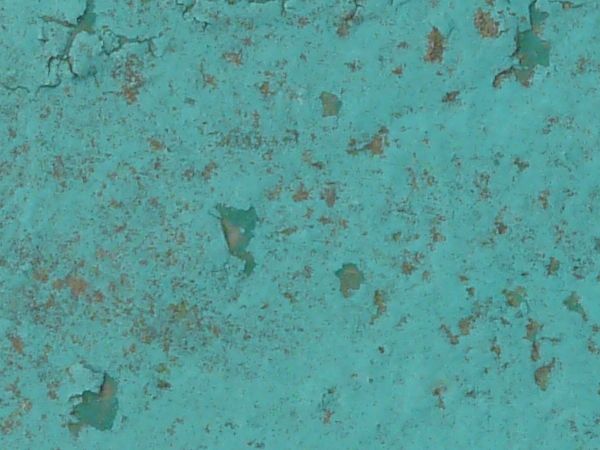 Blue painted metal texture, with extensive chipping, discoloration and faint brown rust stains.