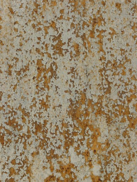 Chipping white paint texture, with yellowish rust spots of various sizes visible throughout.