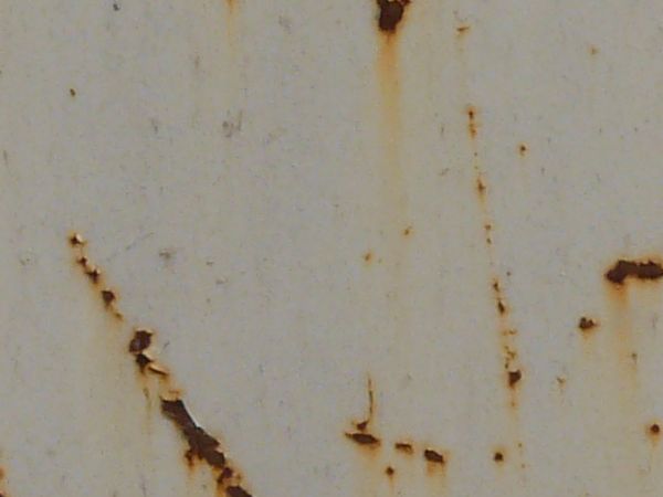 White painted metal texture with several heavy rust scratches and significant brown stains.