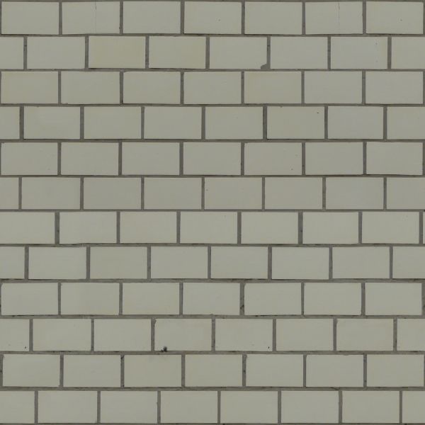 Seamless texture of grey, rectangular tiles set in even formation with clean, consistent surface.