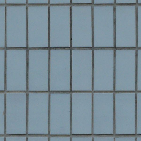 Seamless texture of small, rectangular tiles in light blue tone set evenly.