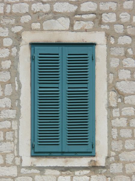 Smooth blue window texture closed by shutters with very little 