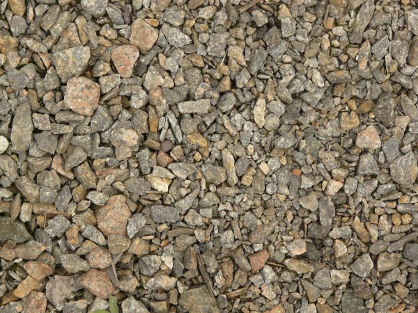 Large pebbles texture, in various sizes and shades of grey and brown.